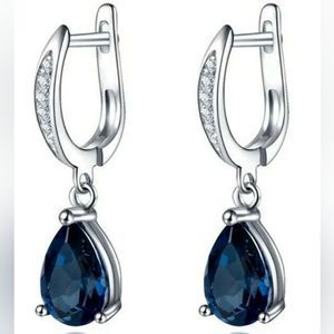 18kgp Blue sapphire pear drop leverback earrings w accent czs.